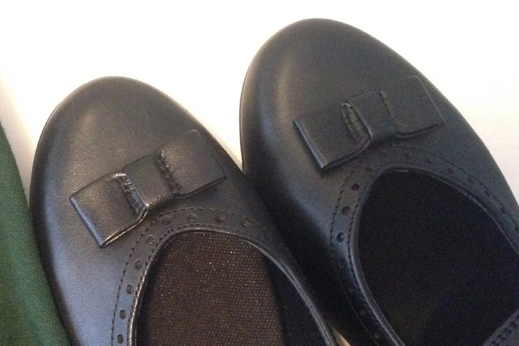 Close-up of the end of Emily's new school shoes