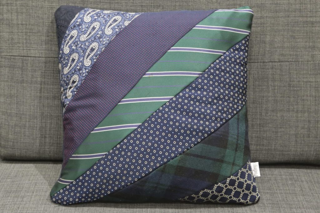 Cushion made from men's neck ties of favious blue and green shades