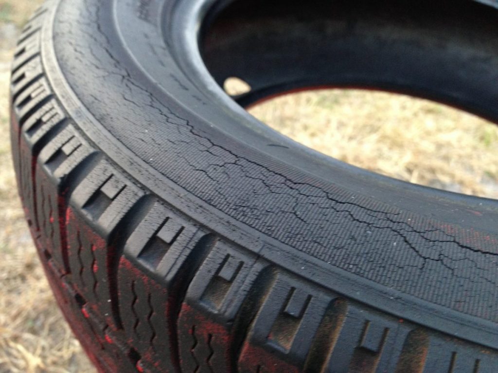 cracked rubber on car tyre