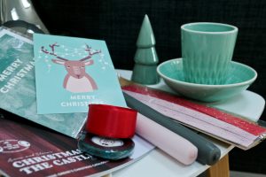 Some of the items I've brought home from Søstrene Grene Nottingam. Including Teal ceramic cup and saucer, ceramic Christmas tree, Cards, candles, napkins, ribbons, catalogue.