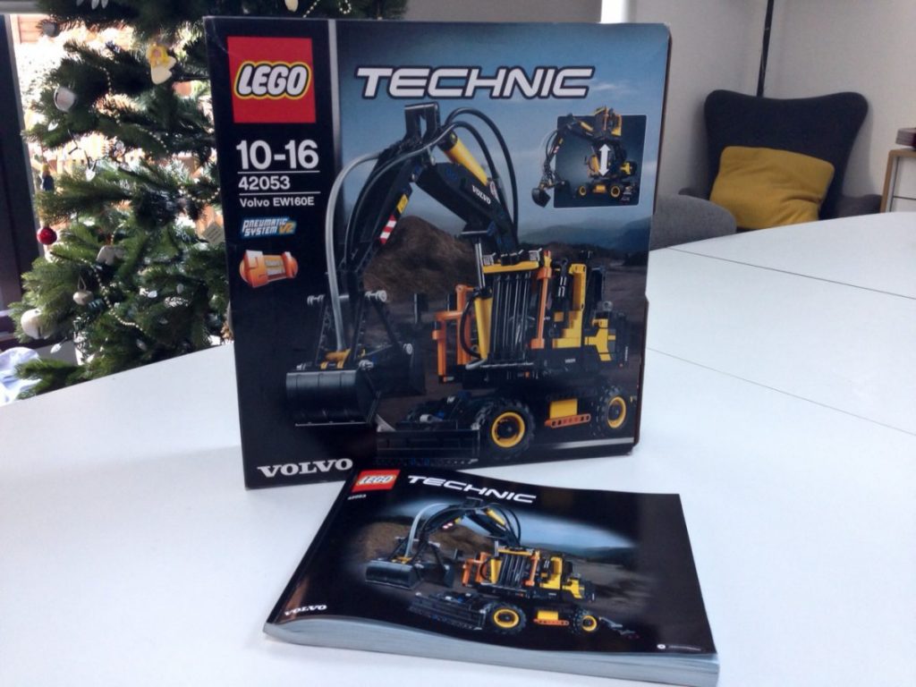 Our family Lego Christmas Tradition: Building a Lego set together, the Lego Volvo EW160E 42053 & instruction book