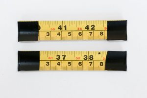10cm lengths of tape measure with electrician's tape over the sharp edges